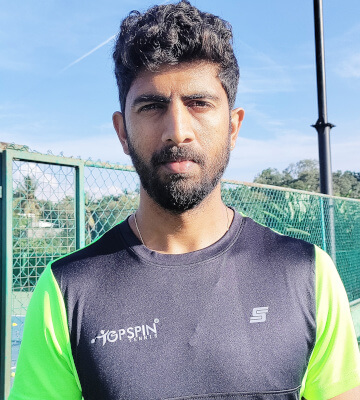 Kiran Nandakumar, Head Coach